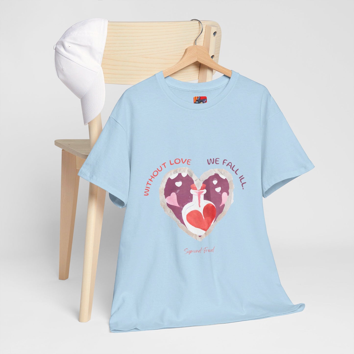 The Love is Essential T-Shirt: Spread Love, Stay Healthy"Without love we fall ill"  Sigmund Freud