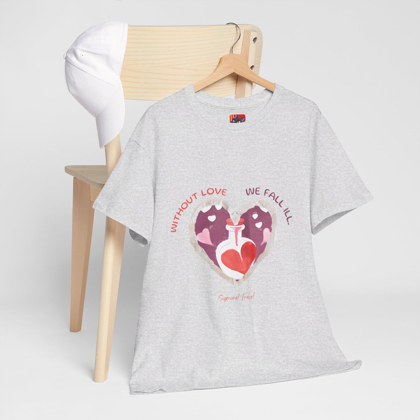 The Love is Essential T-Shirt: Spread Love, Stay Healthy"Without love we fall ill"  Sigmund Freud